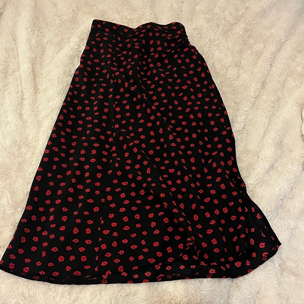 Princess Polly Black Skirt with Red Floral Design
